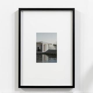 Sleek minimalist black frame around a contemporary photograph